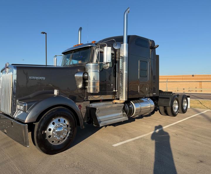 2021 Kenworth W900L 72" Raised Roof Sleeper, front 3/4 passenger side