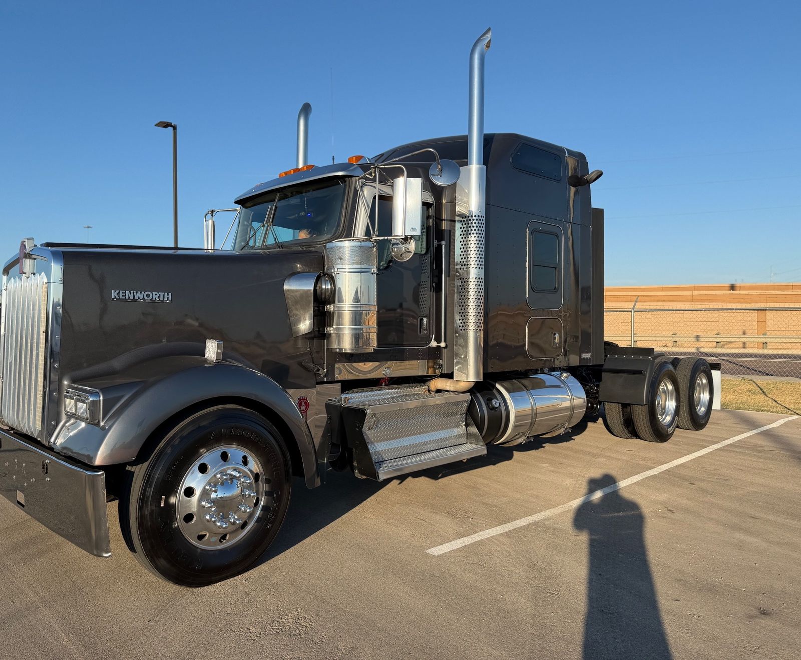 2021 Kenworth W900L 72" Raised Roof Sleeper, front 3/4 passenger side