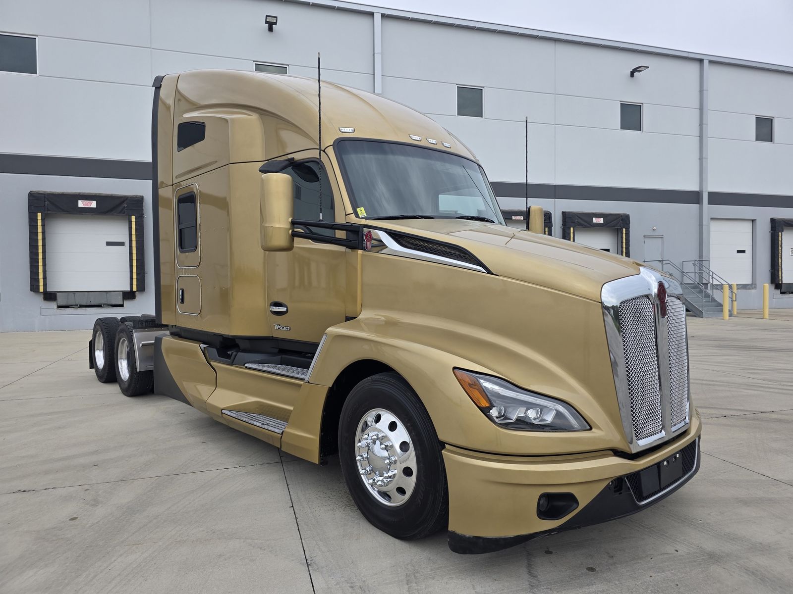 2023 Kenworth T680 76" Sleeper, 13-Speed Manual, front 3/4 passenger side
