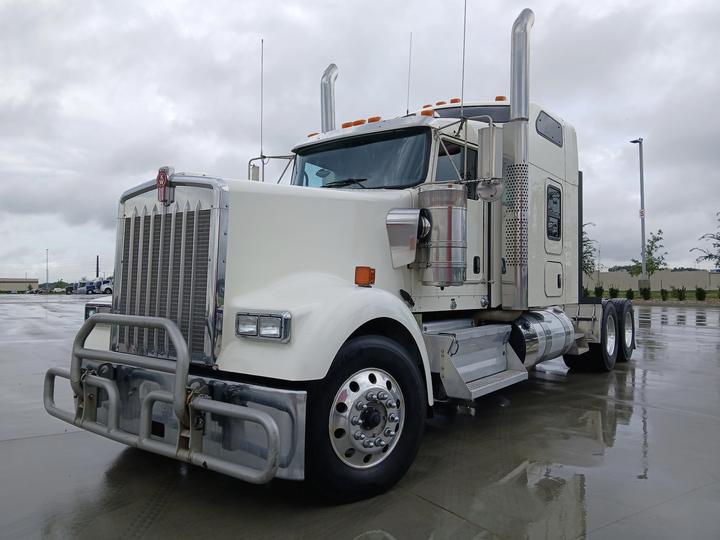 2023 Kenworth W900L 72" Raised Roof Sleeper, front 3/4 driver side
