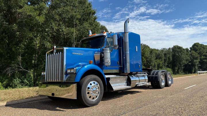 2024 Kenworth W900 62" Flat Top Sleeper, front 3/4 driver side