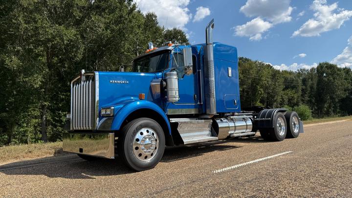 2024 Kenworth W900 62" Flat Top Sleeper, front 3/4 driver side