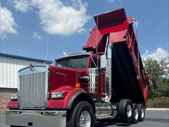 2027 Kenworth W900 Tri-Axle Dump Truck, coral red, bed raised