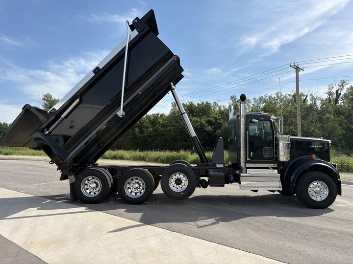 2027 Kenworth W900 Tri-Axle Dump Truck, blackout, bed raised