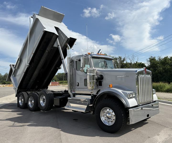 2027 Kenworth W900 Tri-Axle Dump Truck, silver, bed raised